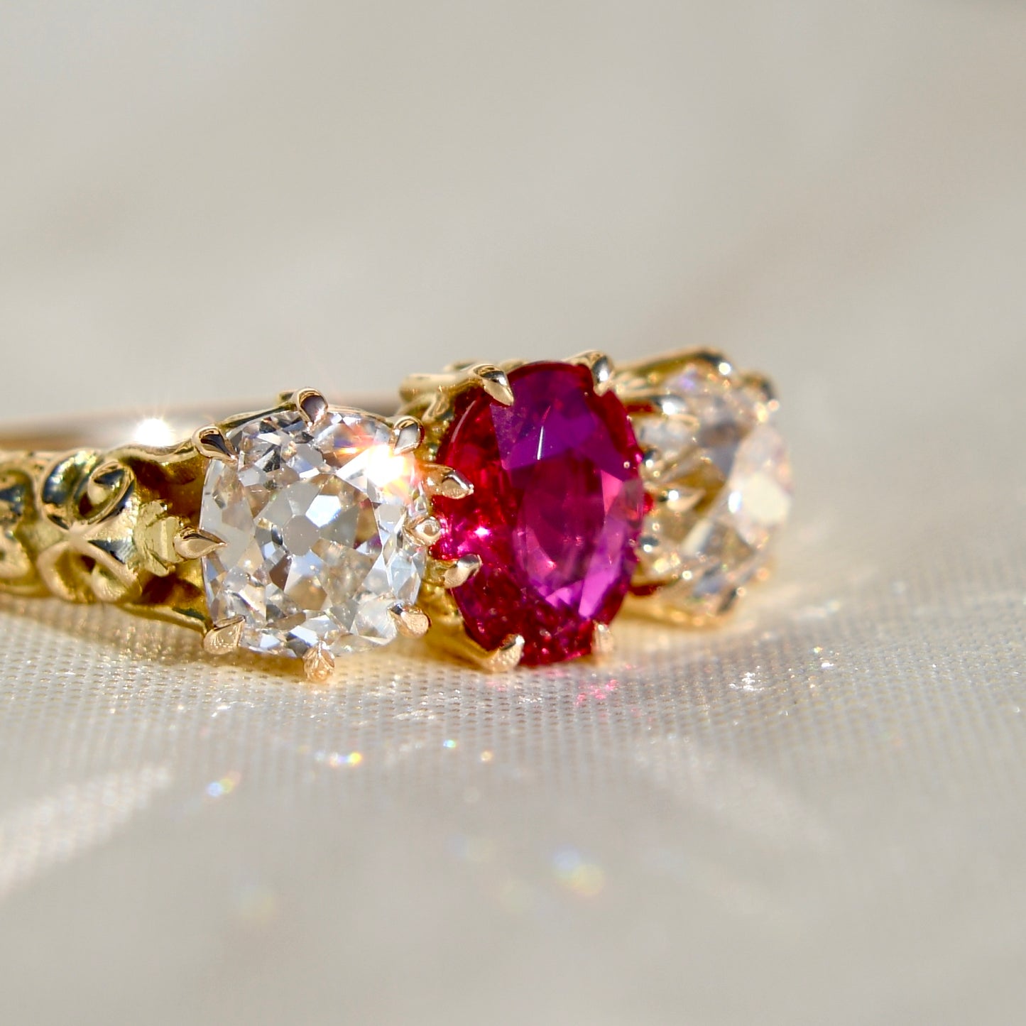 0.94 ct ruby and old mine cut diamond three stone ring