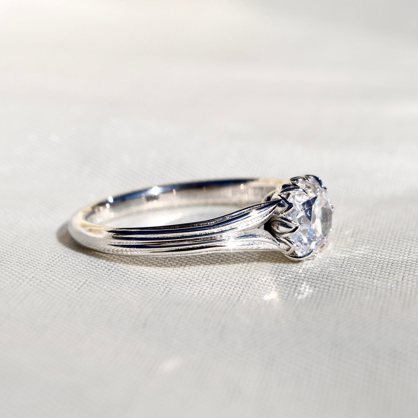 0.96 ct old mine cut diamond tulip solitaire ring