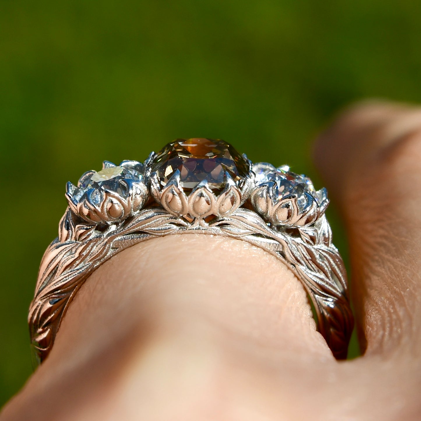 2.97 ct old mine and old European cut diamond tulip three stone ring