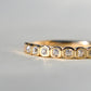 0.24 ct peruzzi cut diamond twelve stone band ring