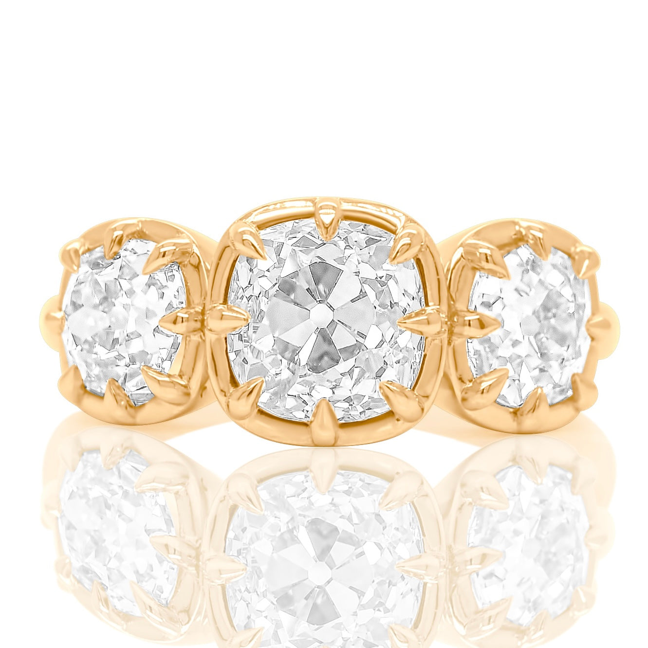 3.35 ct old mine cut diamond three stone ring