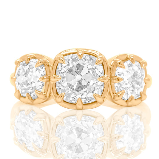 3.35 ct old mine cut diamond three stone ring