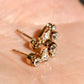 0.84 ct old mine cut diamond swirl stud earrings
