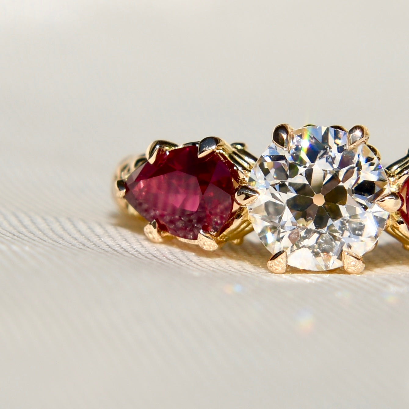 0.84 ct old European cut diamond and ruby three stone ring