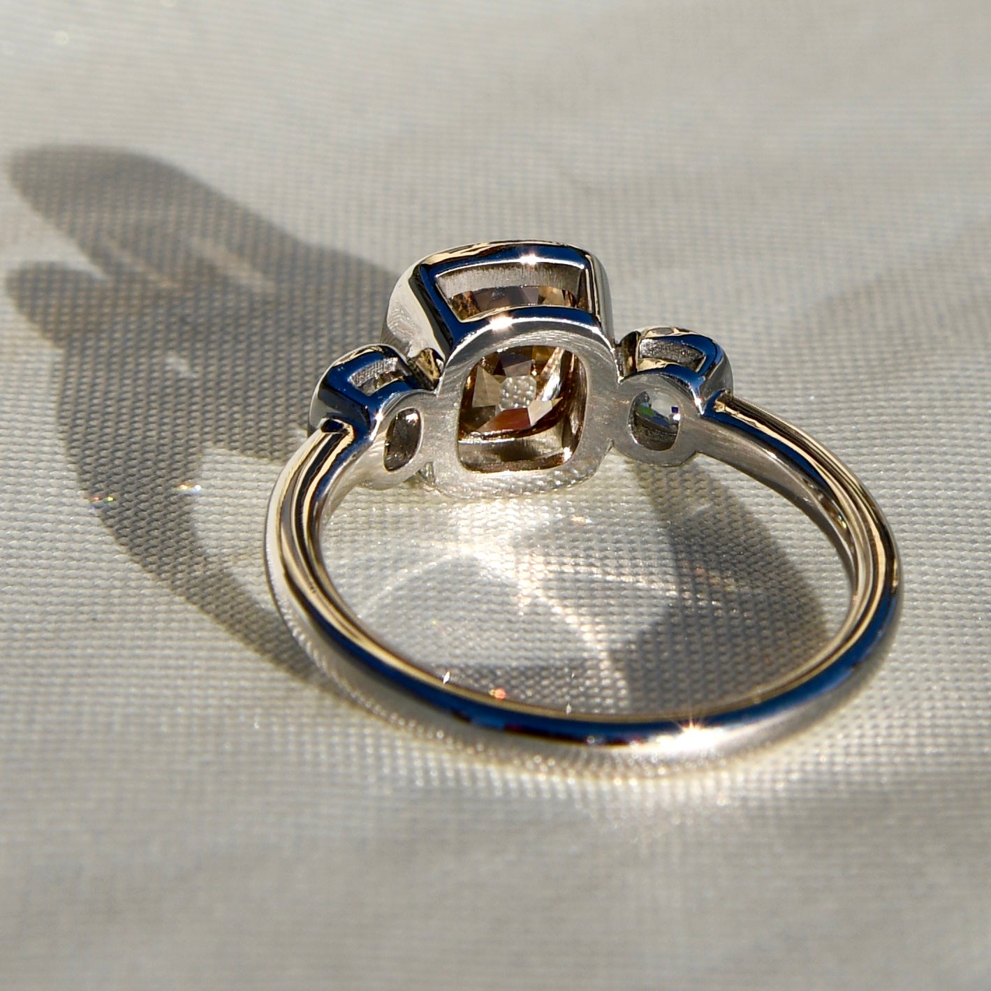 1.50 ct old mine cut diamond three stone ring