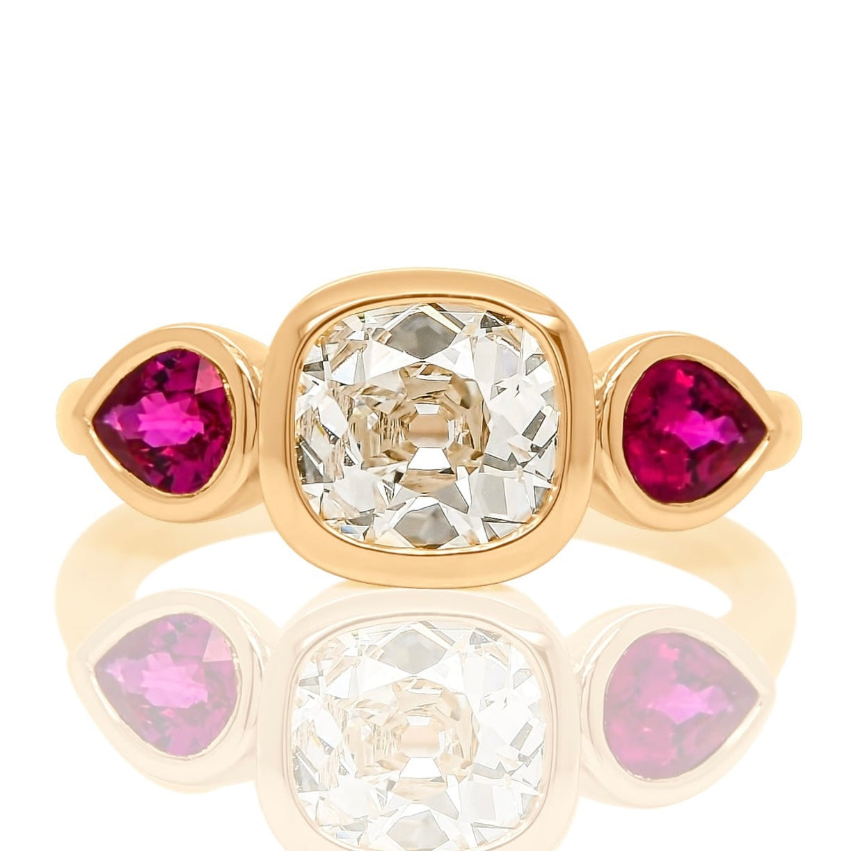 1.18 ct old mine cut diamond and ruby three stone ring