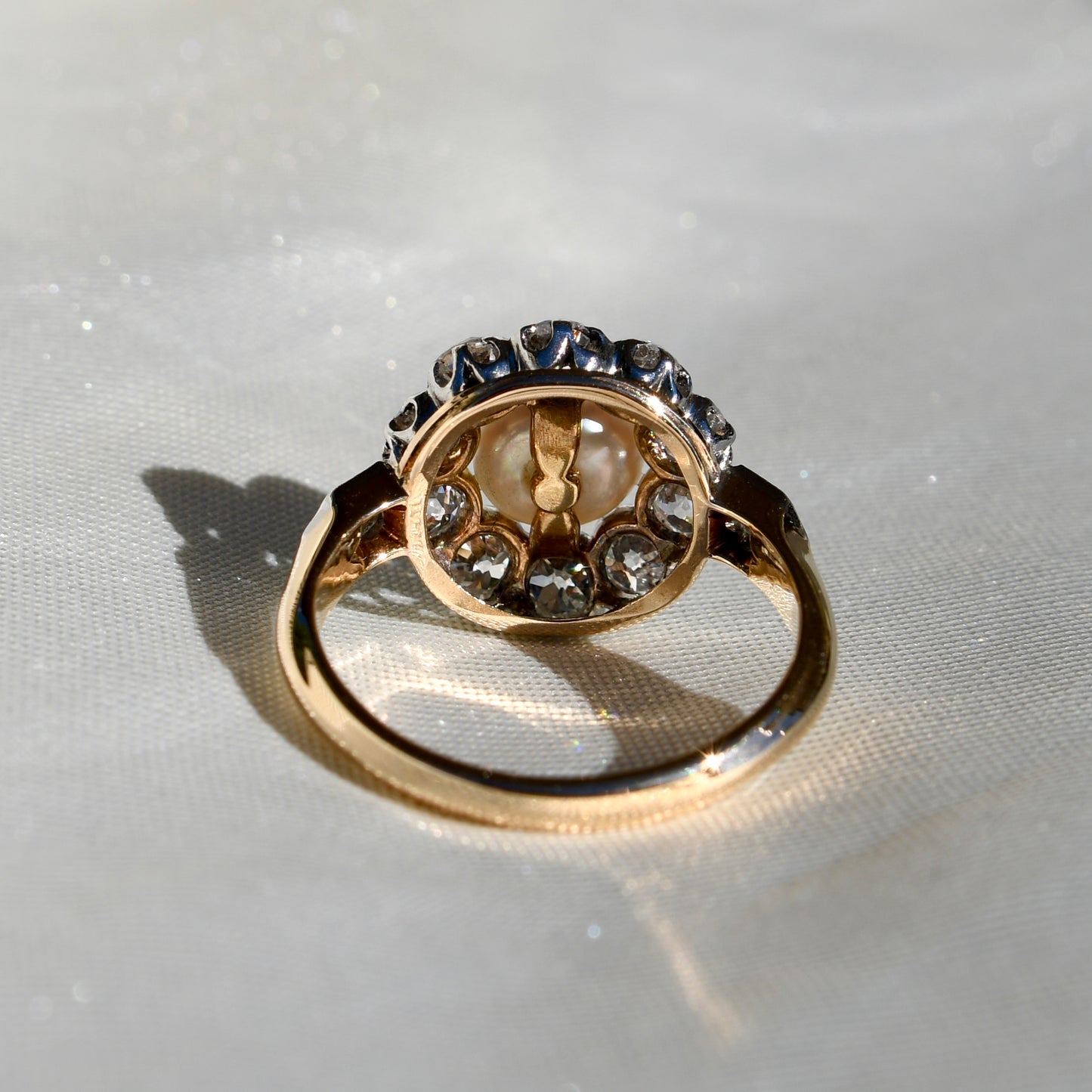Antique Belle Époque natural pearl and 1.36 ct old European cut diamond daisy ring