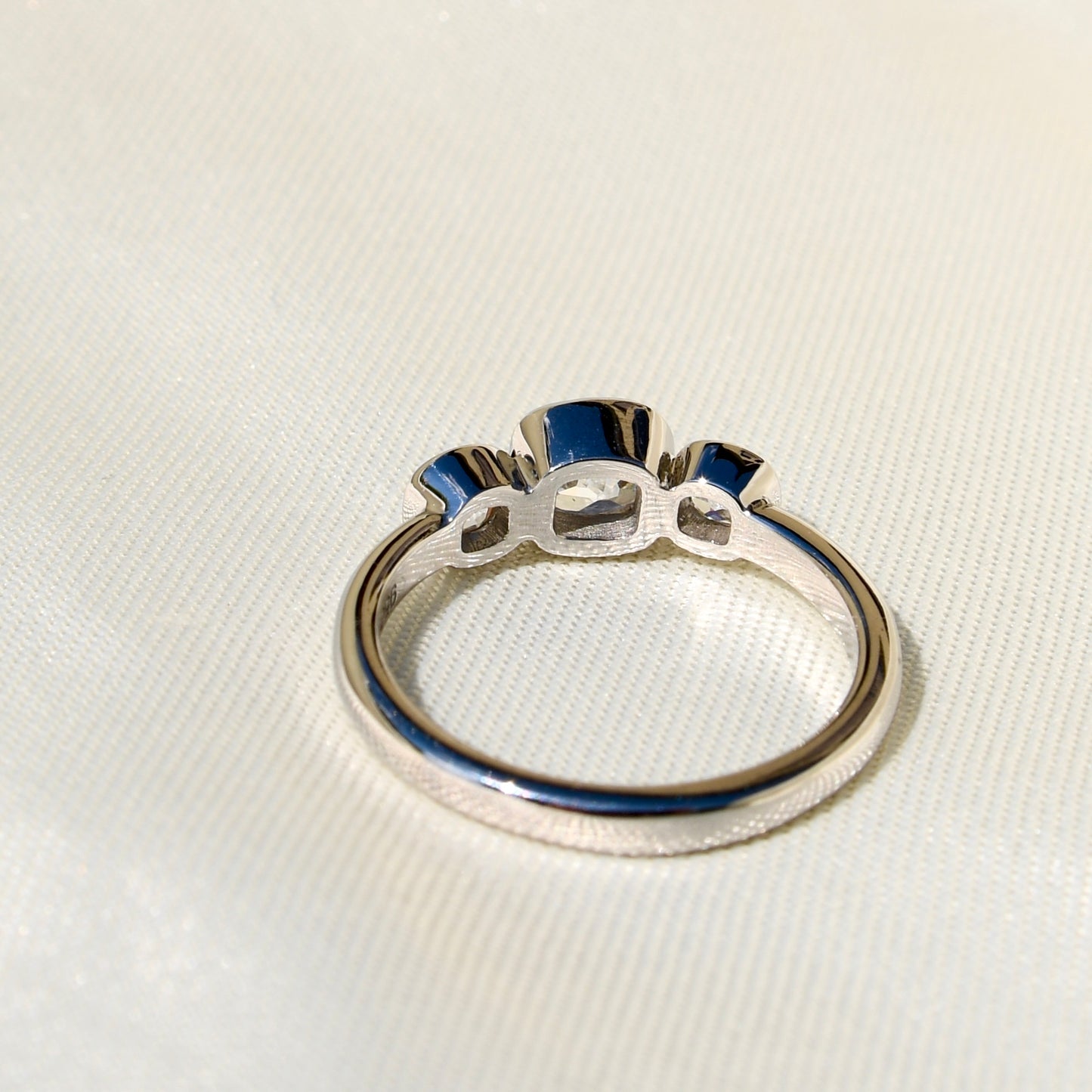 0.70 ct old mine cut diamond three stone ring