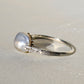 Antique natural saltwater pearl solitaire ring