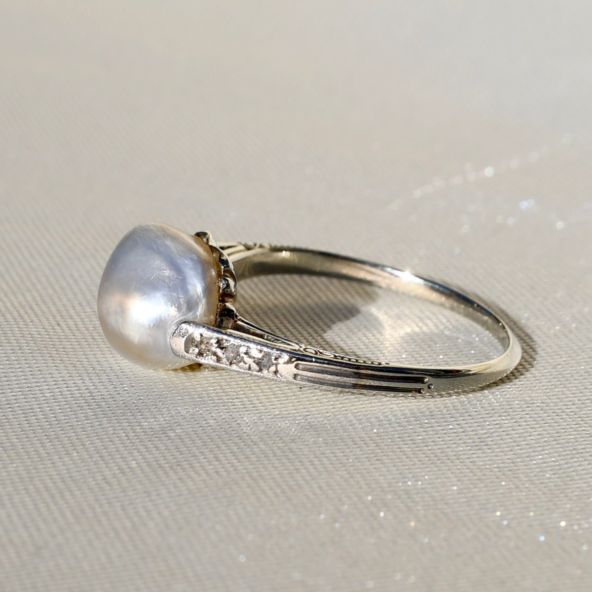 Antique natural saltwater pearl solitaire ring