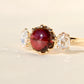 2.15 ct tourmaline cabochon and rose cut diamond three stone ring