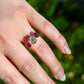 2.22 ct old mine cut diamond and ruby three stone ring