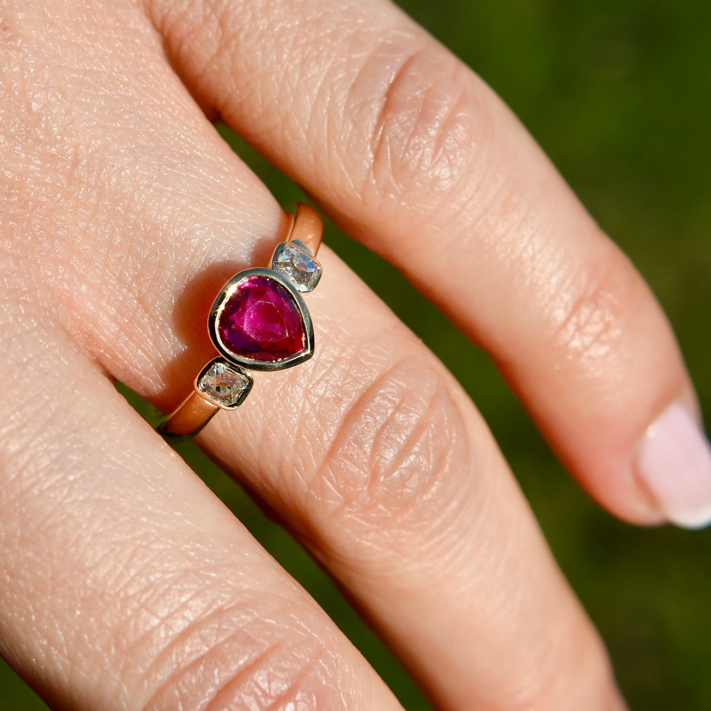 1.01 ct ruby and peruzzi cut diamond three stone ring