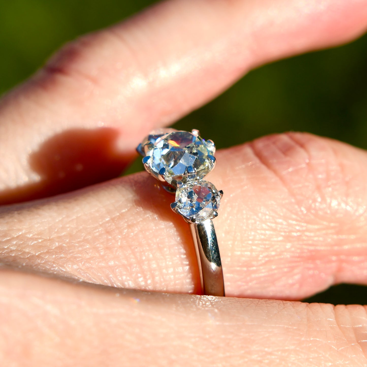 1.25 ct old mine cut diamond three stone ring