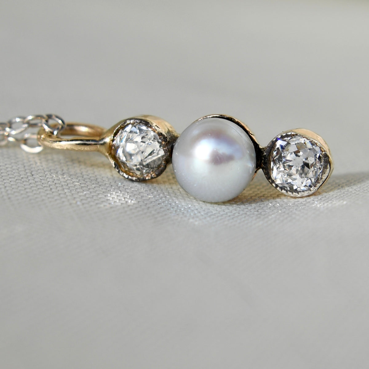 Antique pearl and 0.30 ct old mine cut diamond necklace