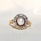 Antique natural pearl and 1.20 ct old mine cut diamond daisy ring
