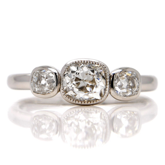 0.70 ct old mine cut diamond three stone ring