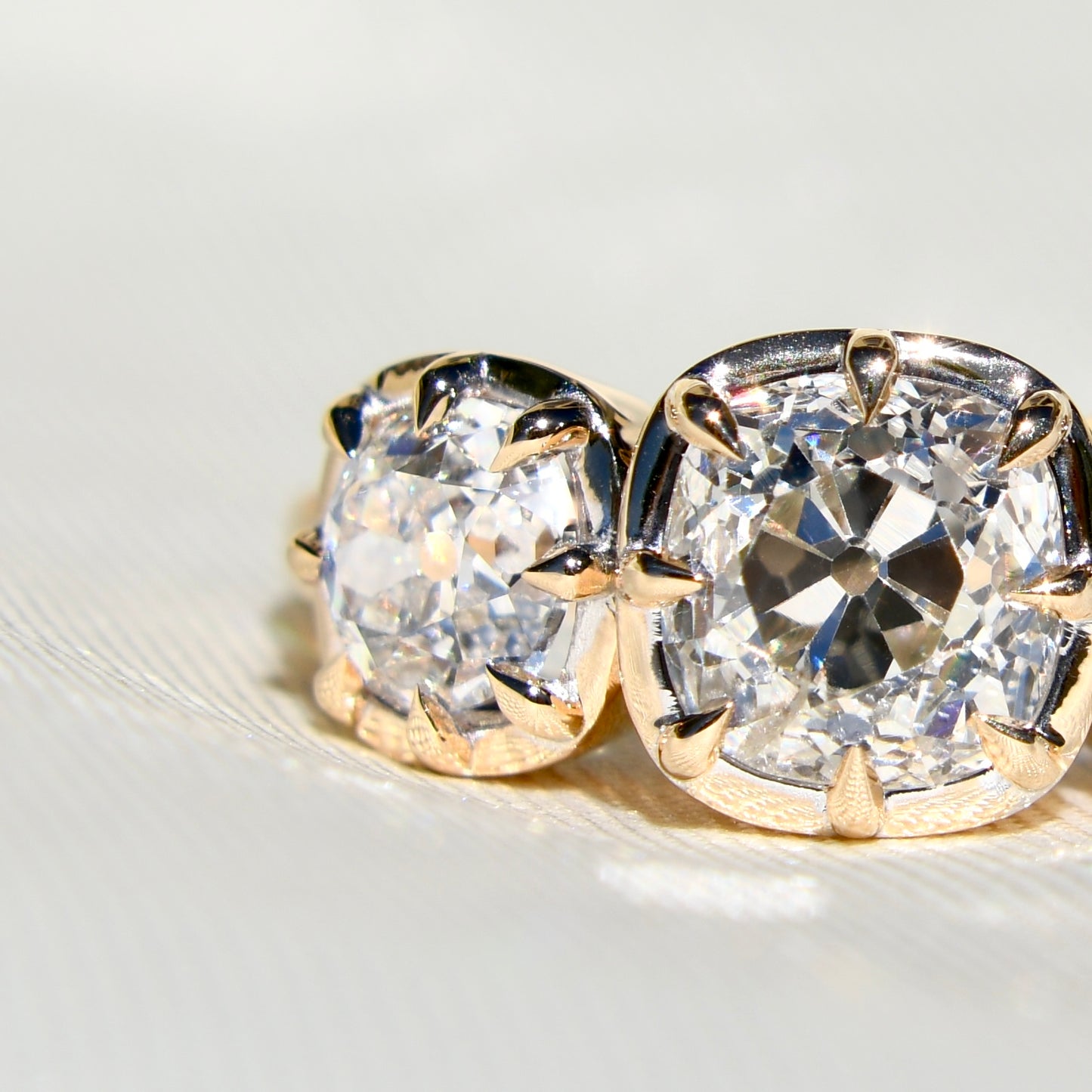 3.35 ct old mine cut diamond three stone ring