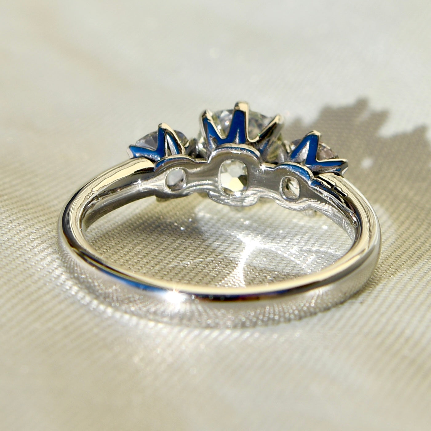 1.25 ct old mine cut diamond three stone ring