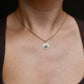 Antique natural pearl and 0.24 ct old mine cut diamond daisy pendant