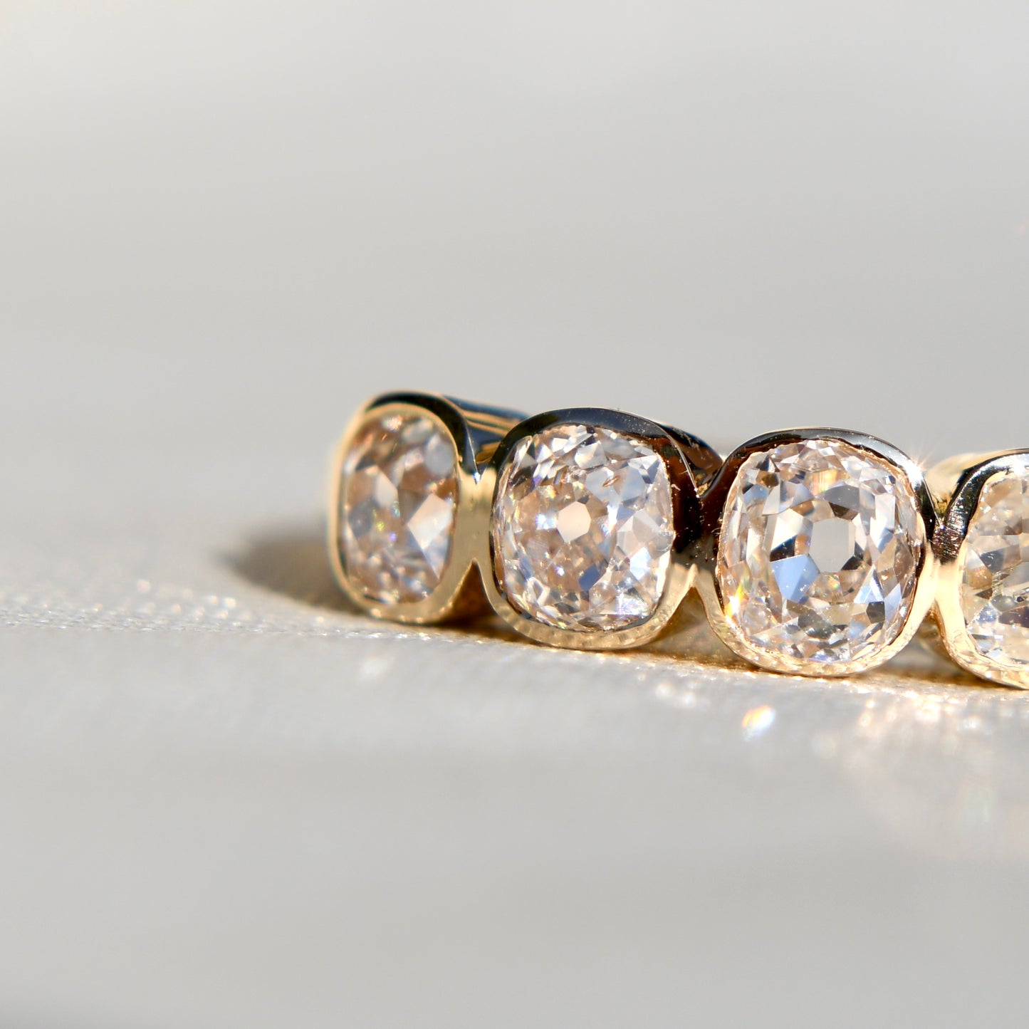 Installment 6/7 - 1.12 ct old mine cut diamond four stone ring