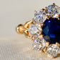 1.15 ct sapphire and old mine cut diamond cluster ring