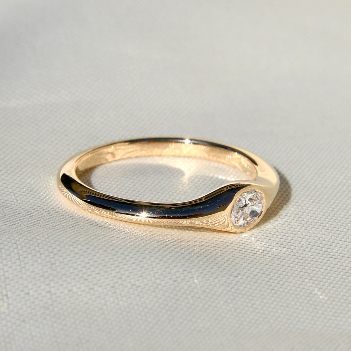 0.22 ct oval old mine cut diamond solitaire band ring