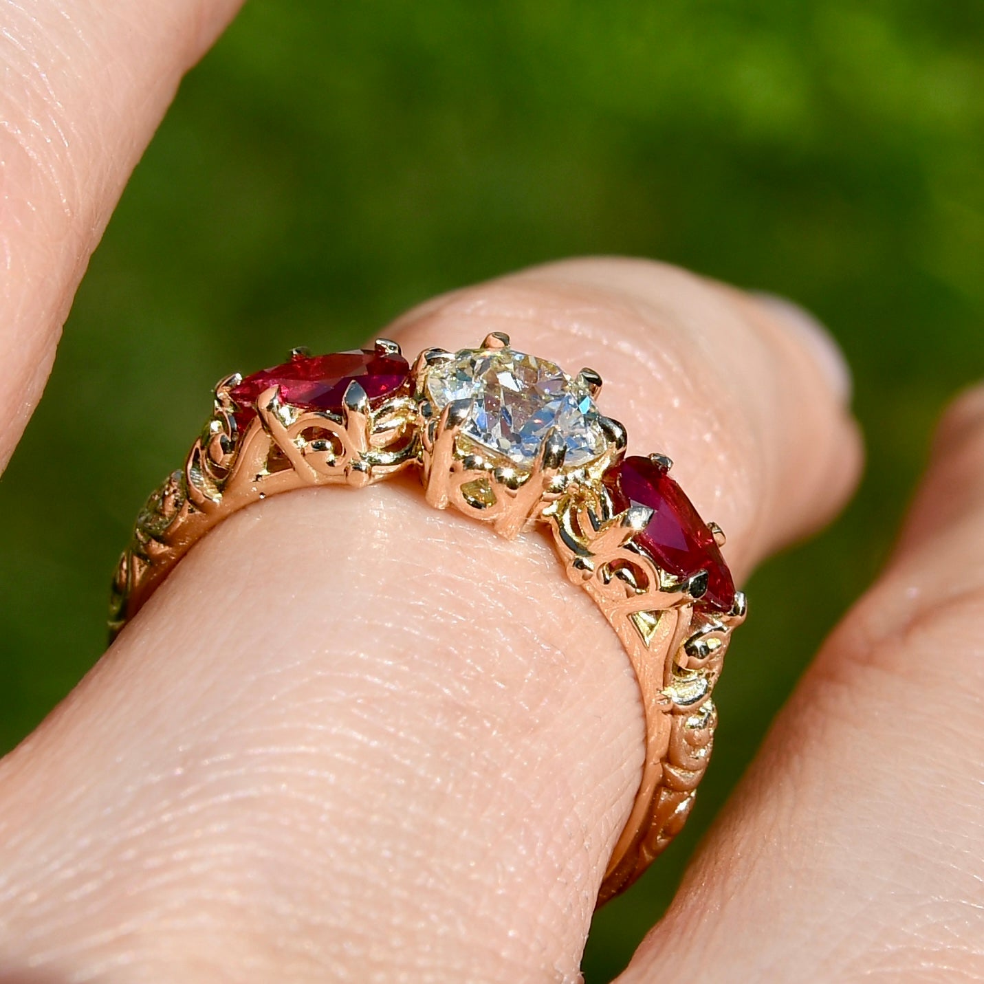 0.84 ct old European cut diamond and ruby three stone ring