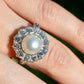Antique Belle Époque natural pearl and 1.74 ct old European cut diamond daisy ring
