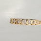 0.57 ct hexagonal, old mine and peruzzi cut diamond nine stone ring