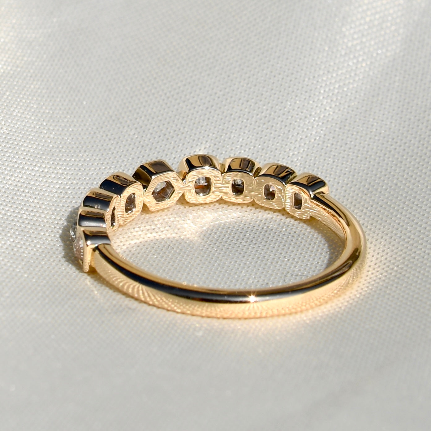 0.57 ct hexagonal, old mine and peruzzi cut diamond nine stone ring