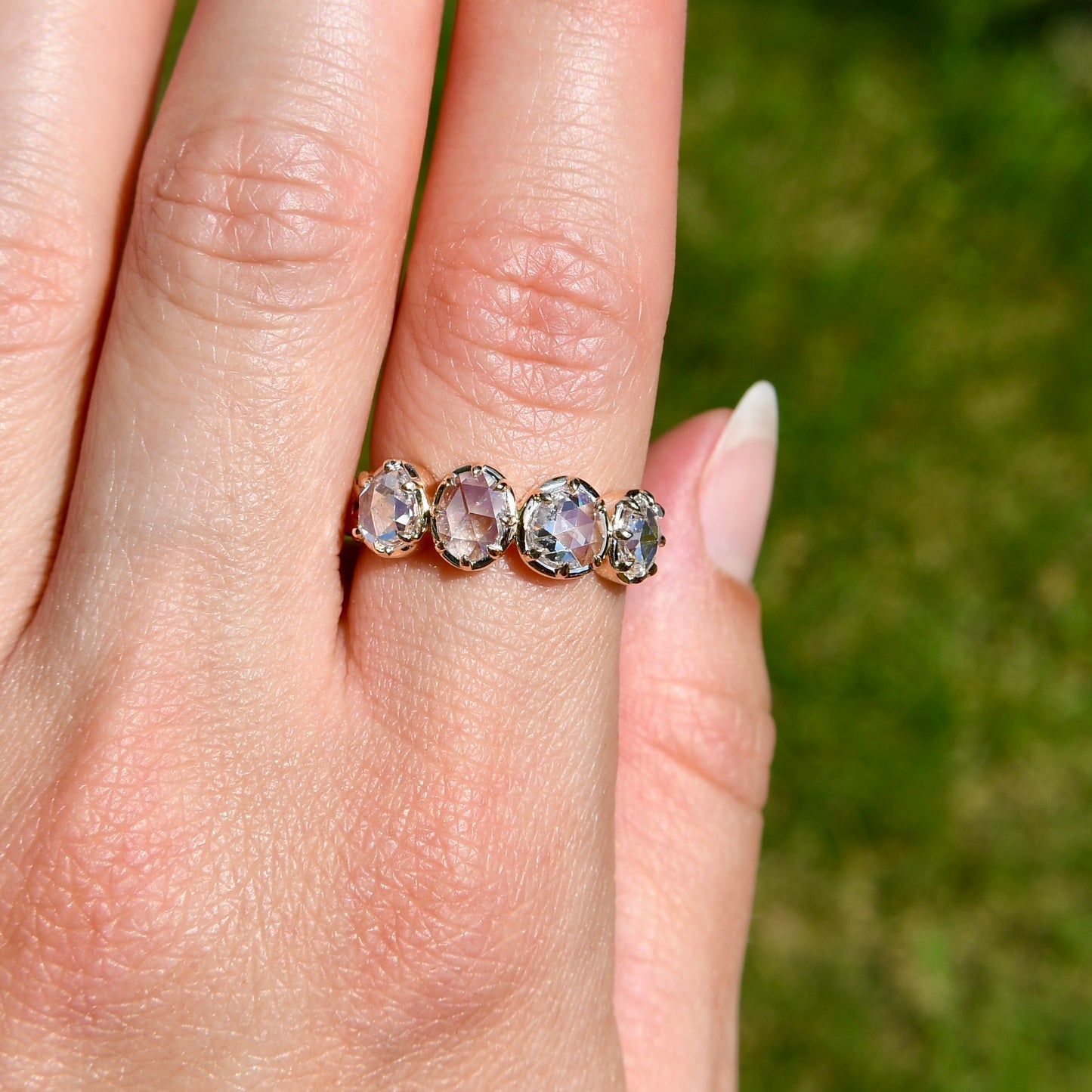1.30 ct rose cut diamond four stone band ring