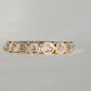 0.57 ct hexagonal, old mine and peruzzi cut diamond nine stone ring