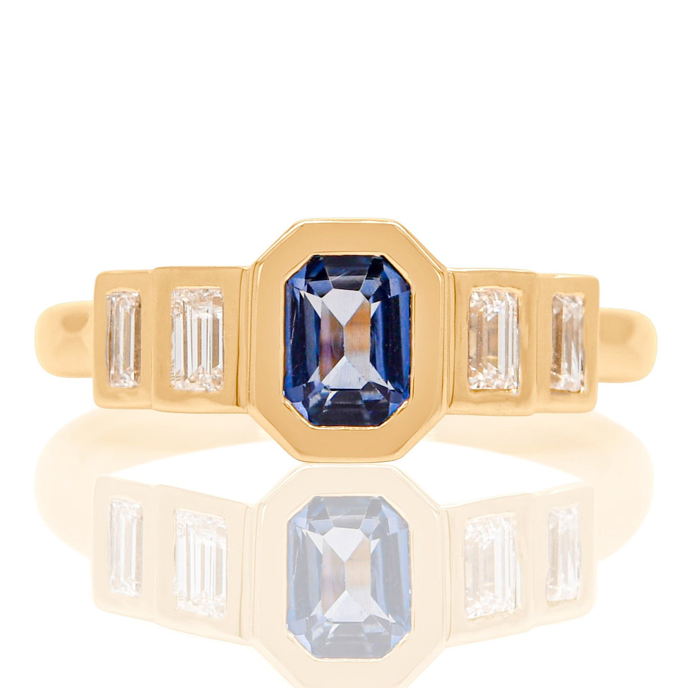 0.61 ct Ceylon sapphire and baguette cut diamond five stone ring