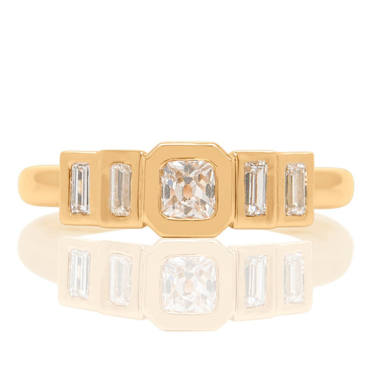 0.23 ct peruzzi and baguette cut diamond five stone ring