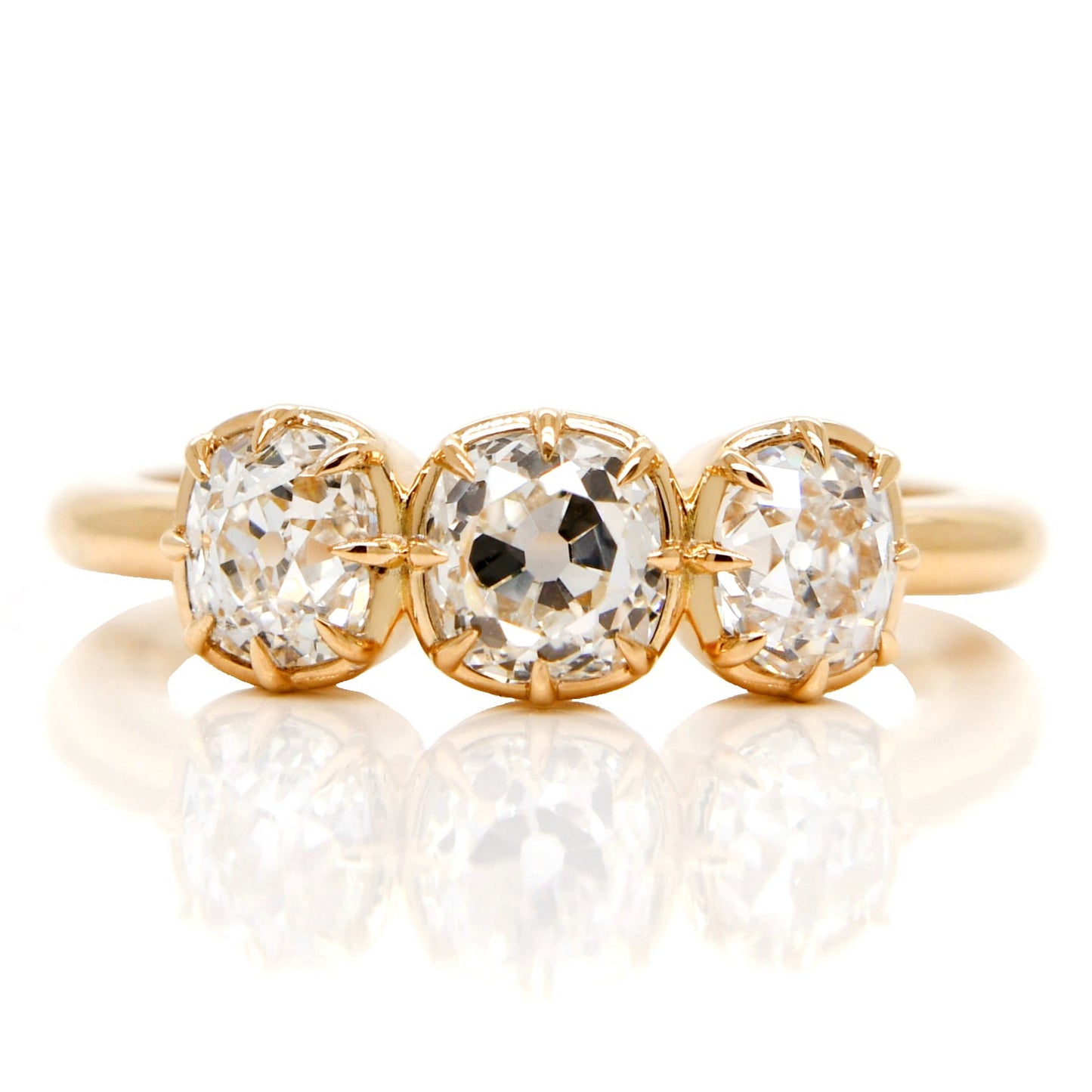 0.53 ct old mine cut diamond three stone ring