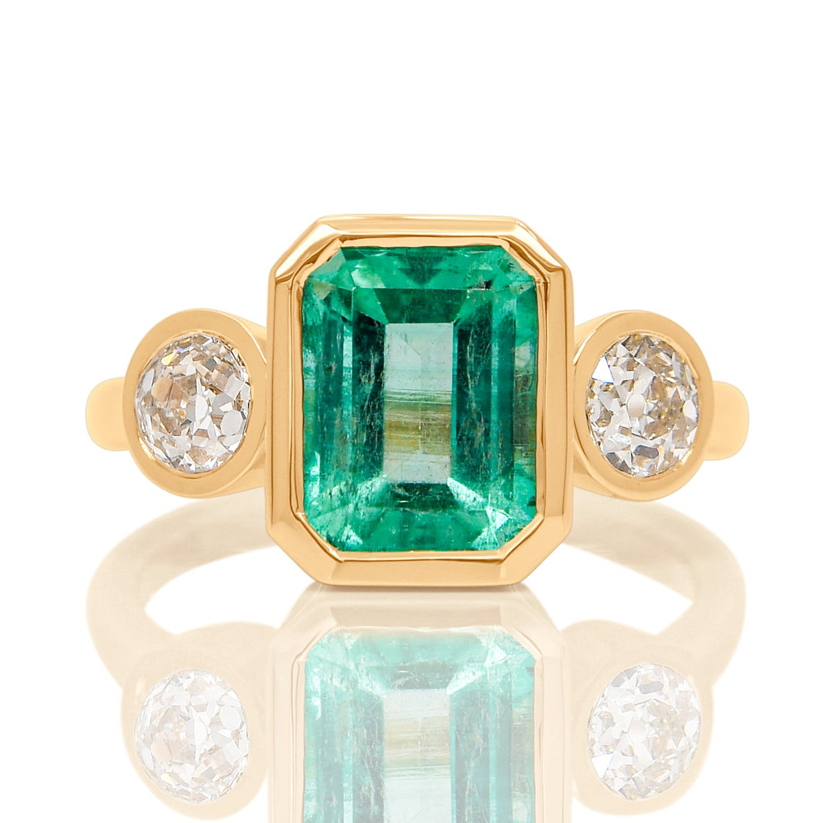 2.65 ct Colombian emerald and old mine cut diamond three stone ring