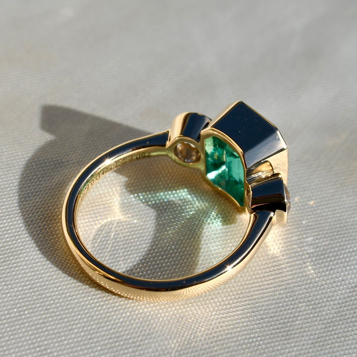 2.65 ct Colombian emerald and old mine cut diamond three stone ring