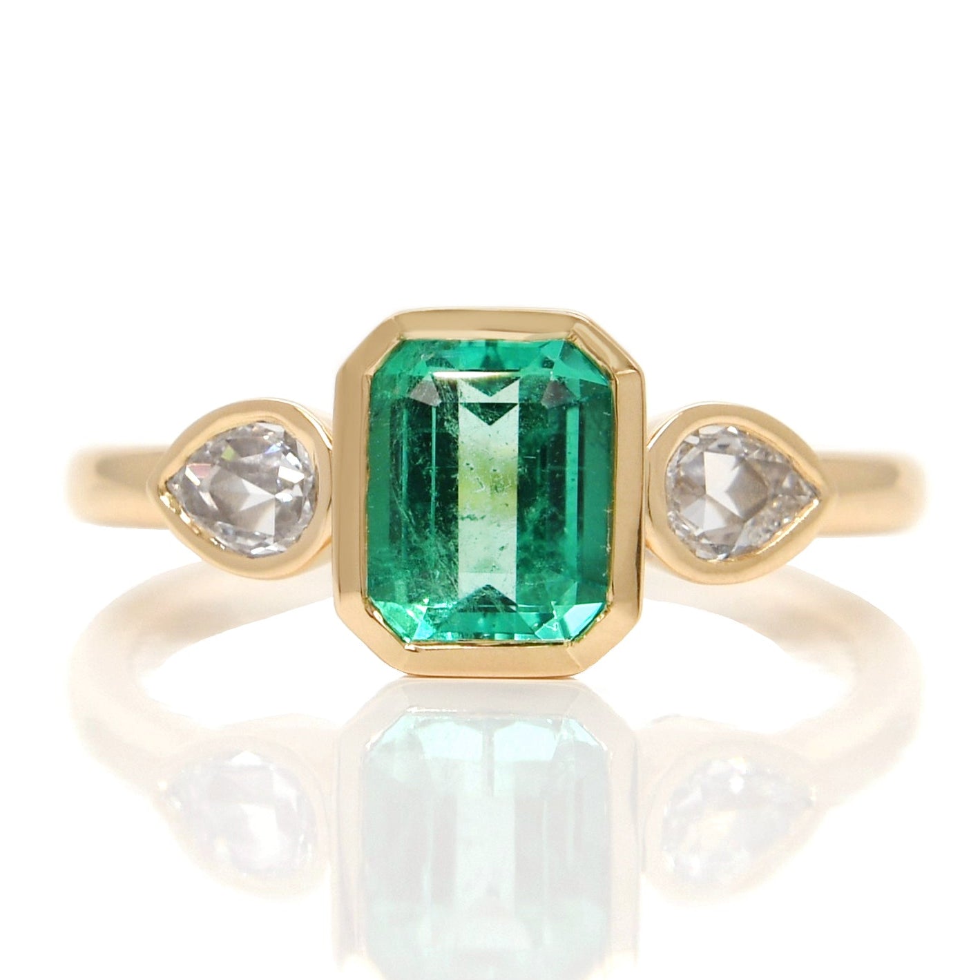 0.91 ct Colombian emerald and pear rose cut diamond three stone ring
