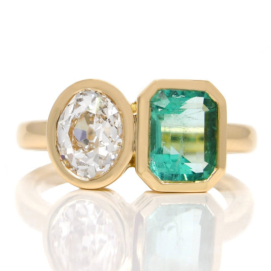 1.02 ct Colombian emerald and oval old mine cut diamond Toi et Moi ring