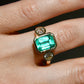 2.65 ct Colombian emerald and old mine cut diamond three stone ring