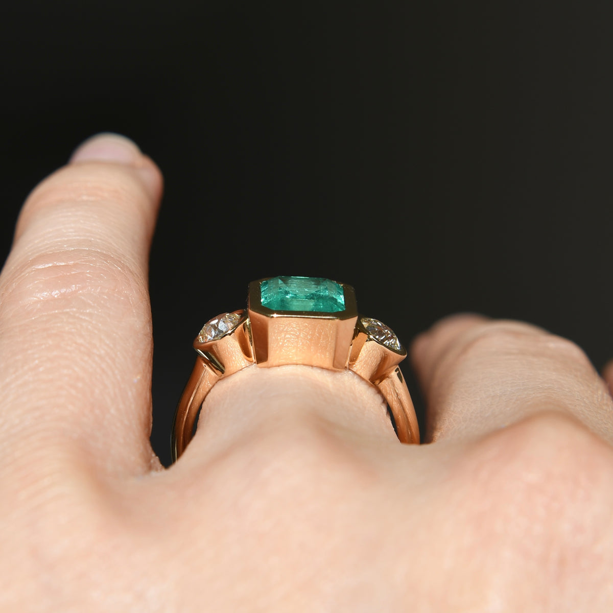 2.65 ct Colombian emerald and old mine cut diamond three stone ring
