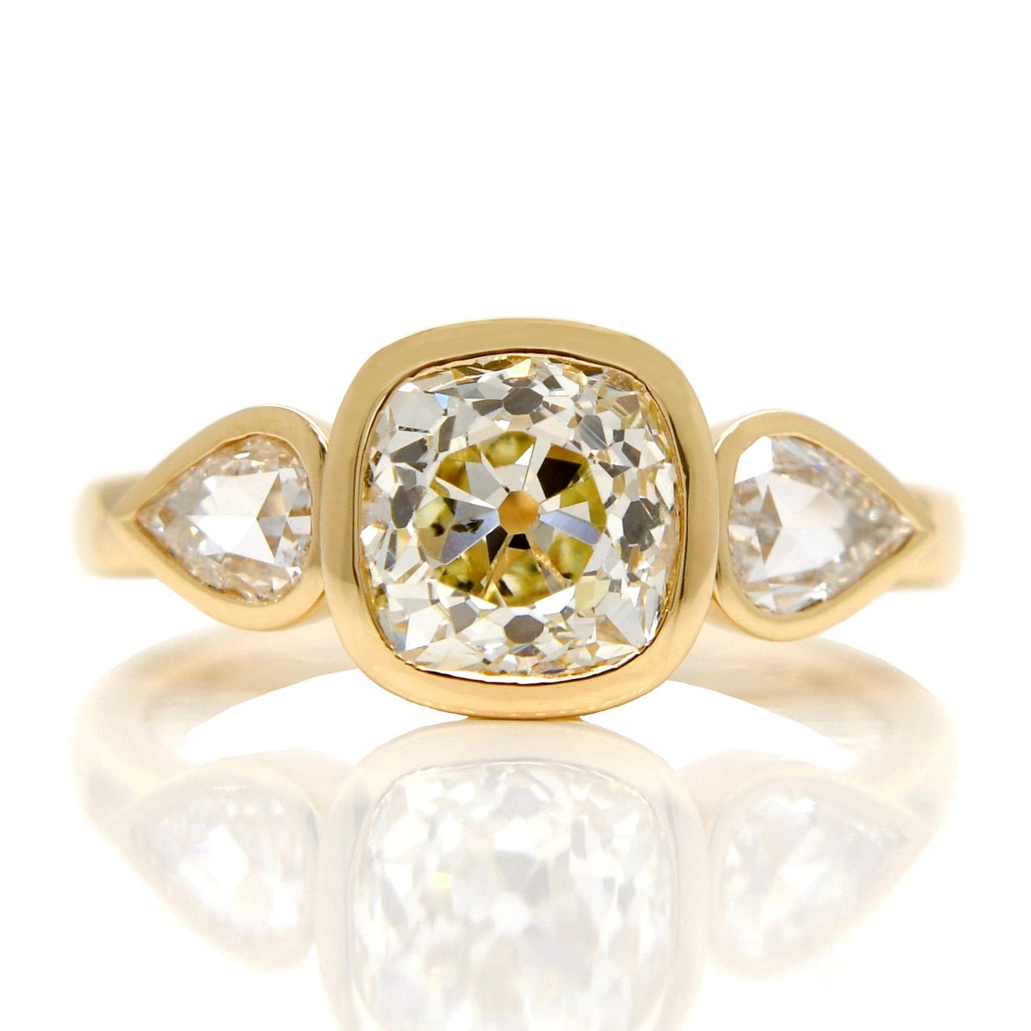 1.78 ct old mine and pear rose cut diamond three stone ring
