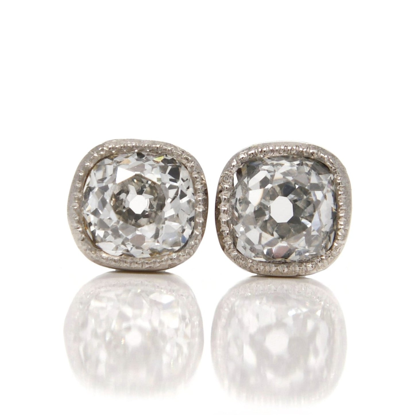 0.76 ct old mine cut diamond studs