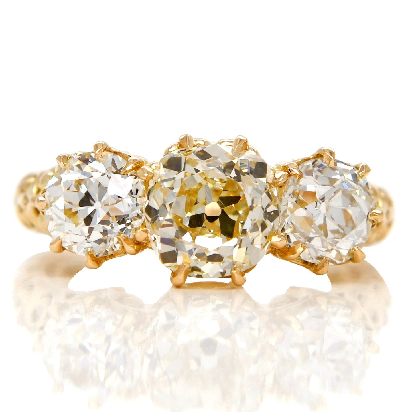 1.62 ct old mine and old European cut diamond three stone ring