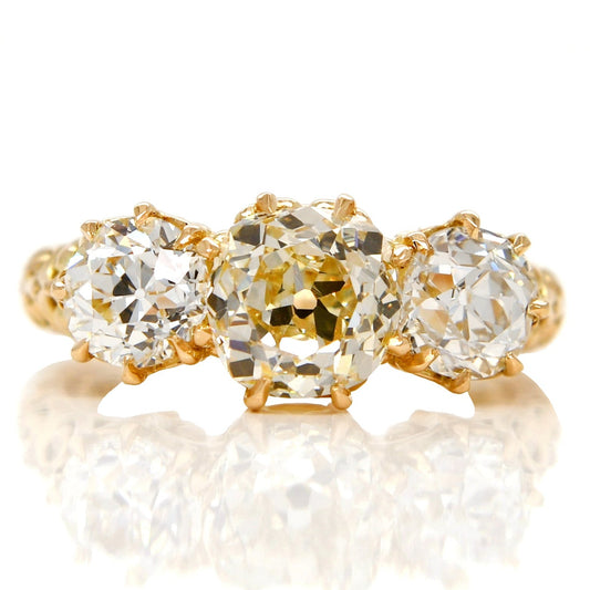 1.62 ct old mine and old European cut diamond three stone ring