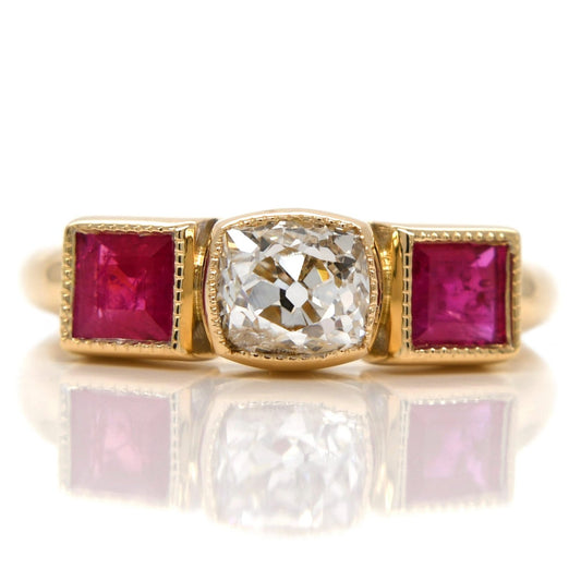 0.83 ct old mine cut diamond and ruby three stone ring