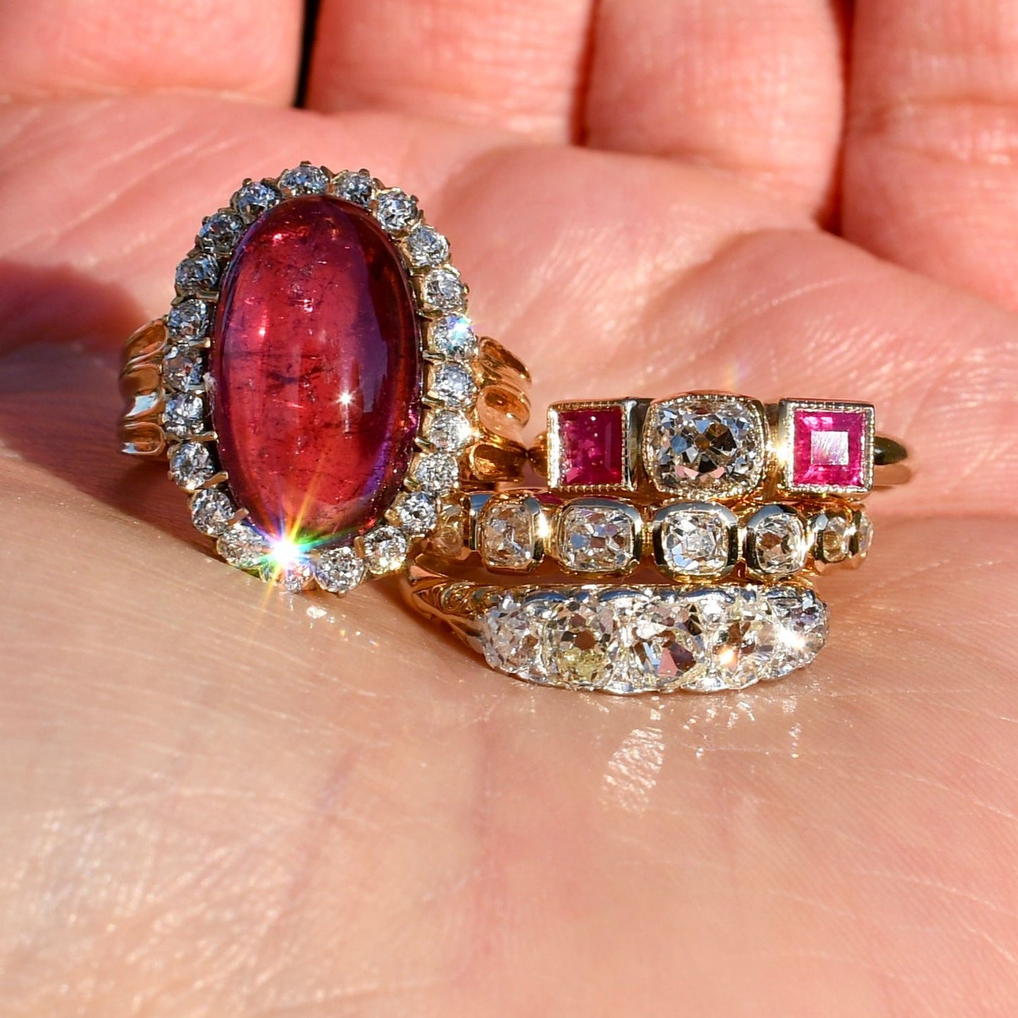 0.83 ct old mine cut diamond and ruby three stone ring