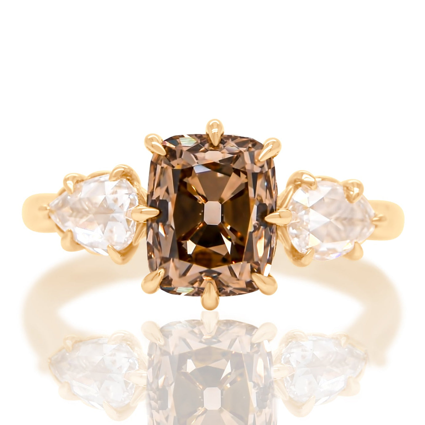 2.03 ct old mine and pear rose cut diamond three stone ring