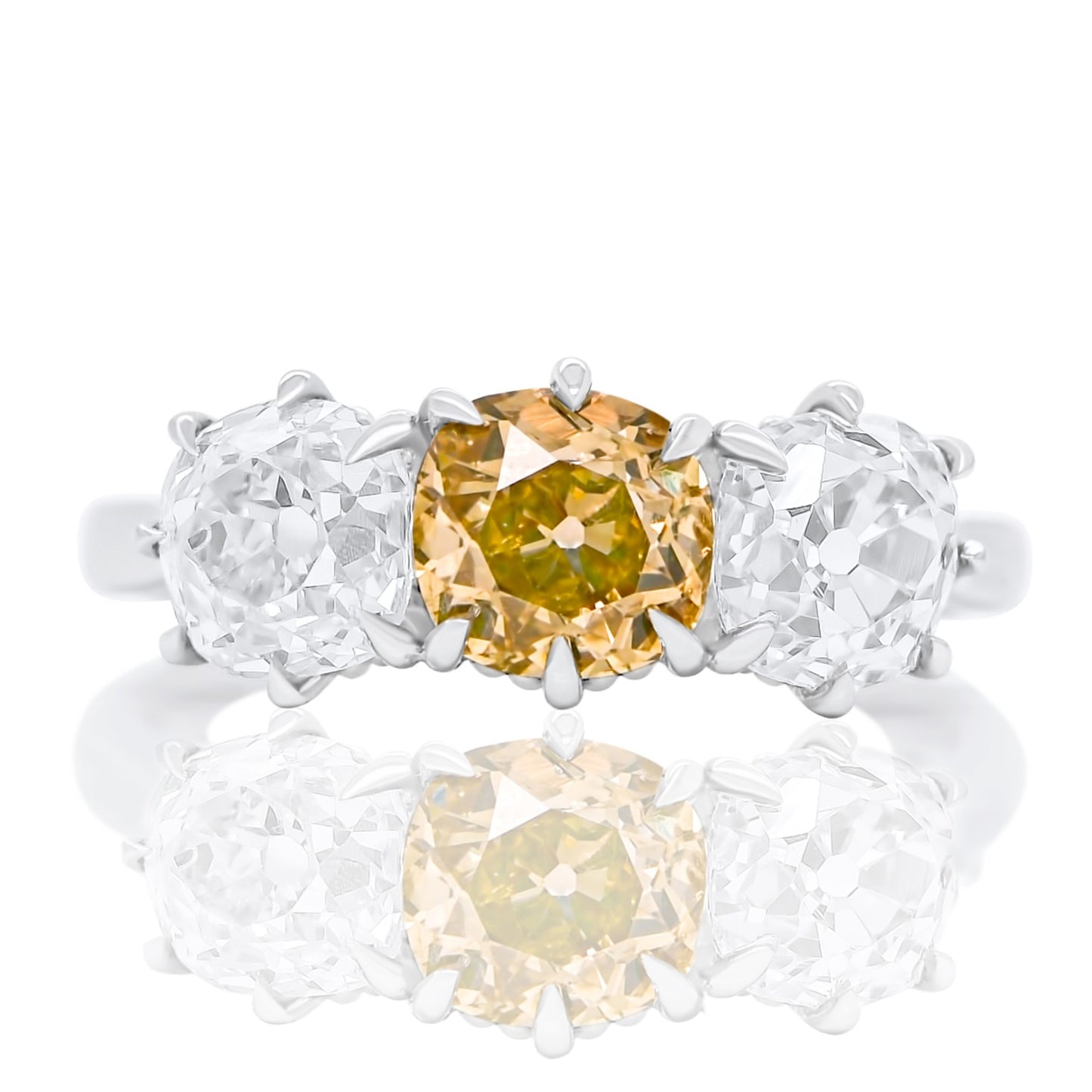 2.66 ct old mine cut diamond three stone ring